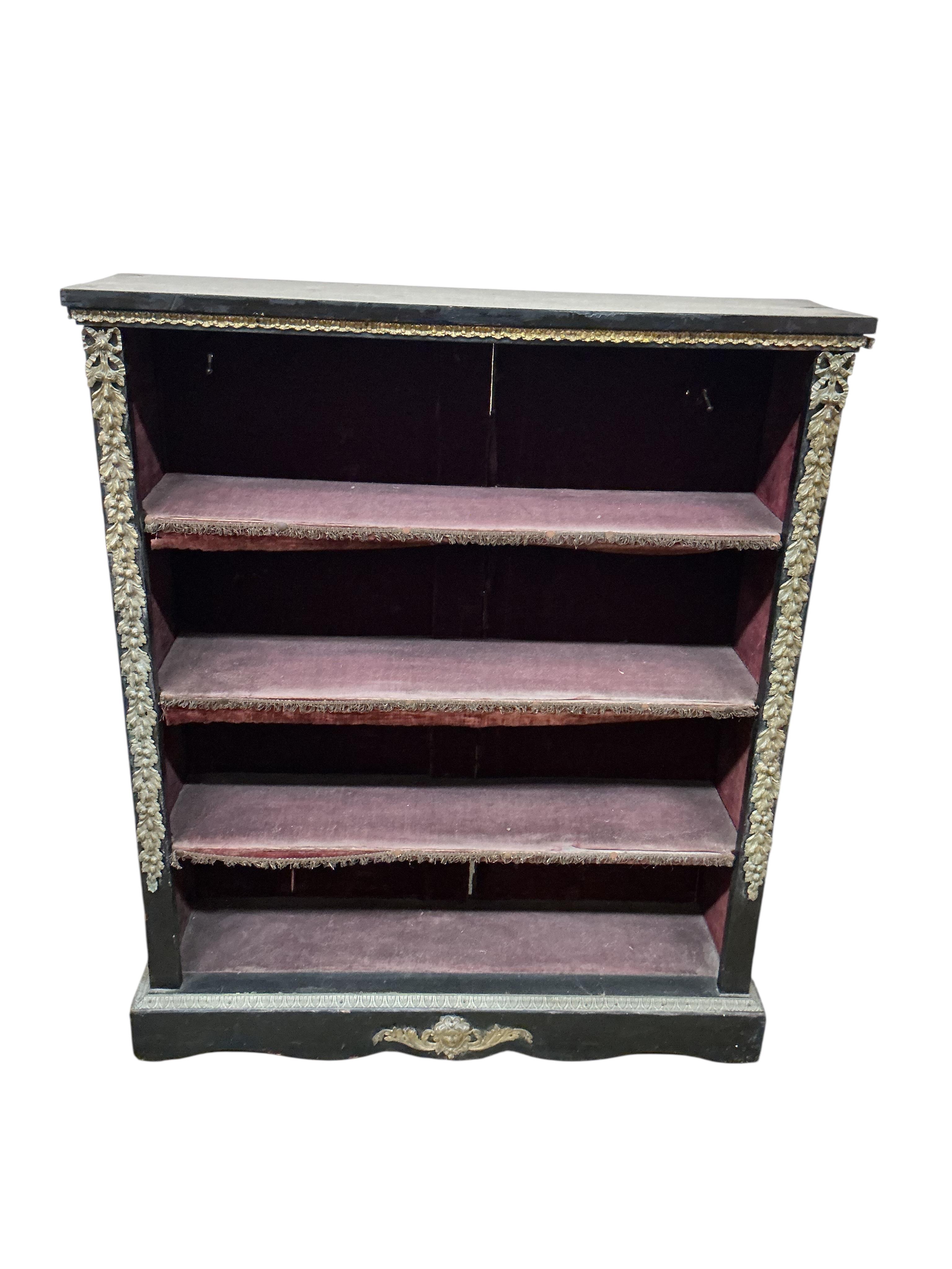 A Victorian gilt metal mounted ebonised open bookcase, width 96cm, depth 26cm, height 113cm